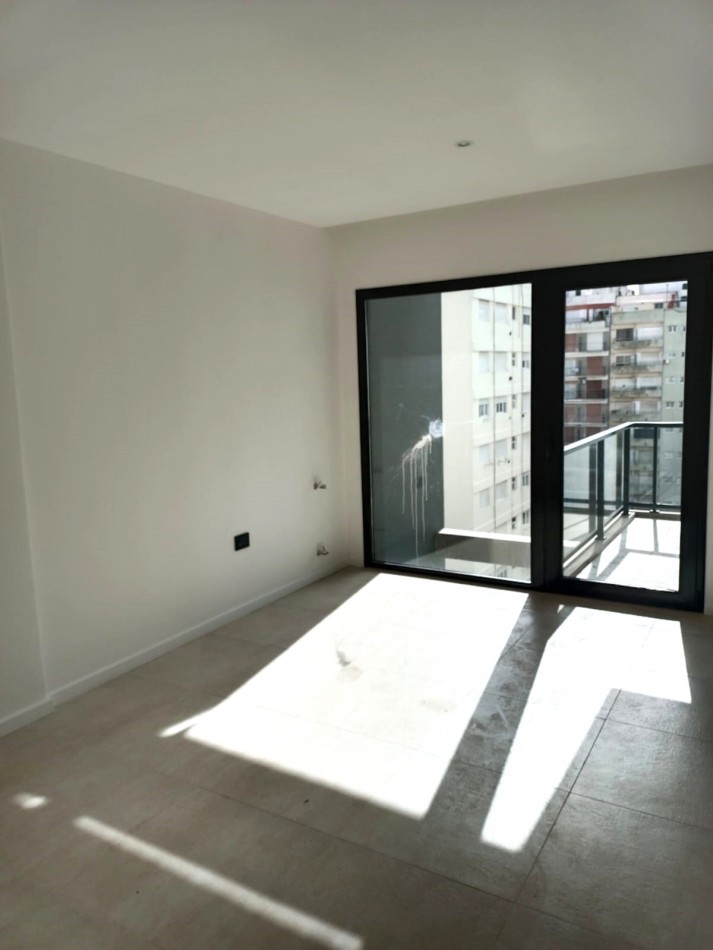 DEPARTAMENTO 2 AMBIENTES A ESTRENAR CON COCHERA 