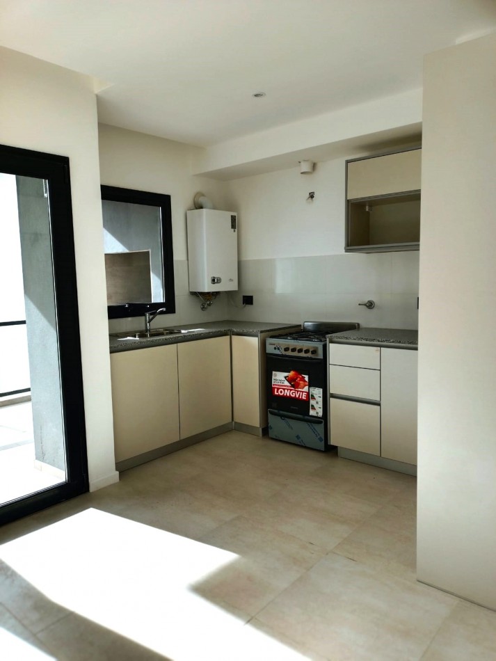 DEPARTAMENTO 2 AMBIENTES A ESTRENAR CON COCHERA 